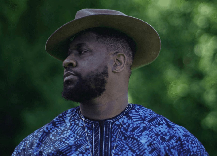 Keshida Layone in a wide-brimmed hat, showreel cover